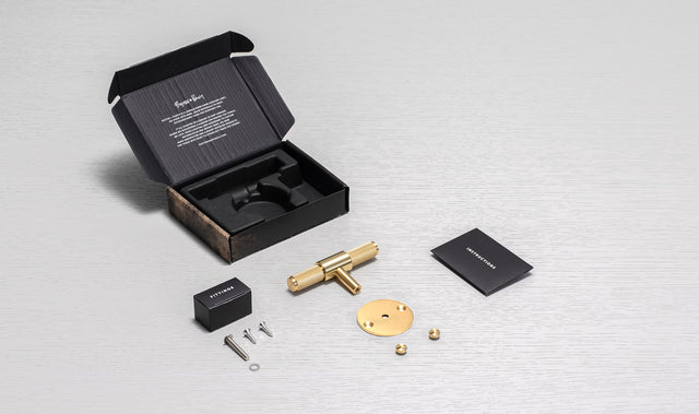 T-Bar fogantyú Busterrel + lyukasztólemezzel