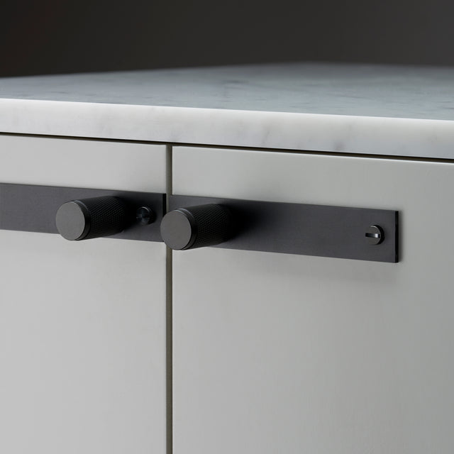 Mobili Butoni con piastra Cross Buster + Punch